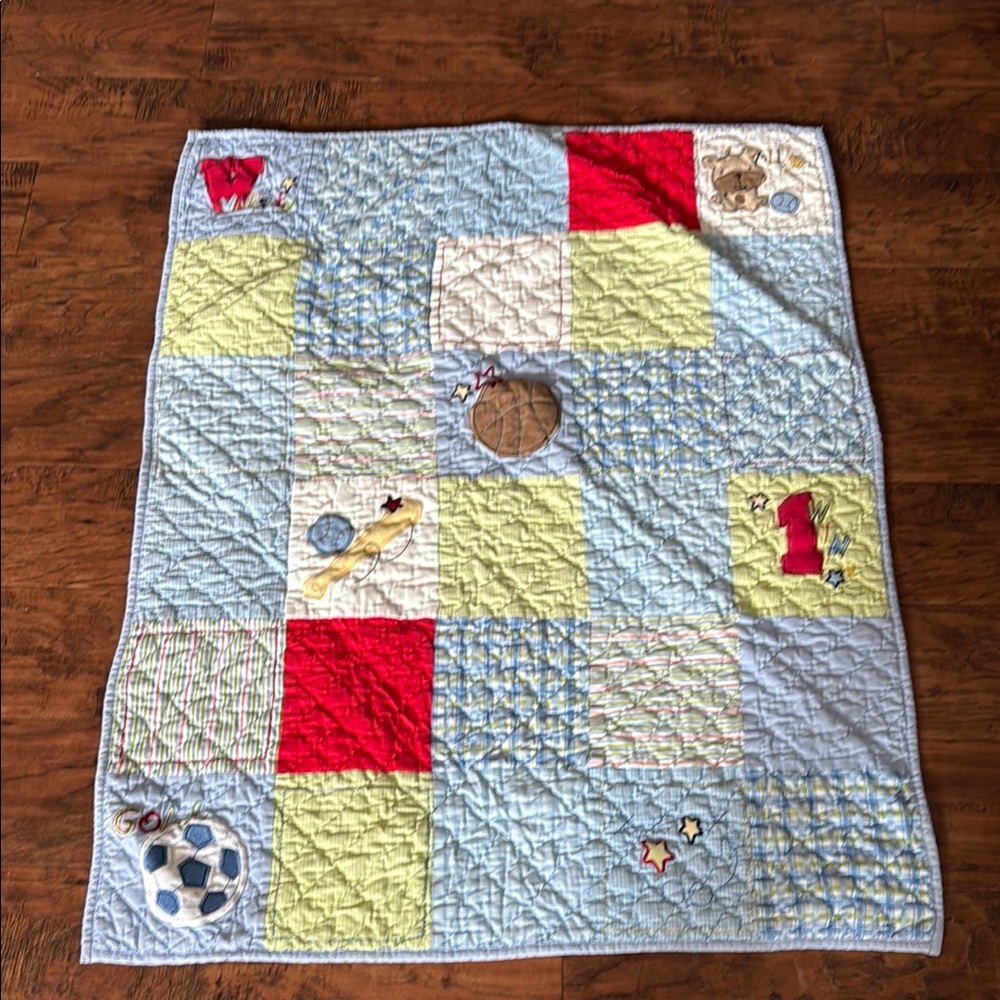 Varsity Baby Quilt with Red and Yellow Accents. Home quilted